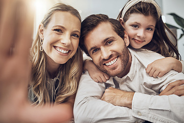 Image showing Portrait, love or parents take a selfie with a girl as a happy family in house living room bonding in Australia. Mother, father or child relaxing with a smile enjoying quality time or taking pictures