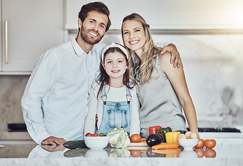 Image showing Portrait, parents or girl cooking vegetables as as happy family in a house kitchen with organic food for dinner. Development, father or mom teaching, helping or bonding with a healthy child at home