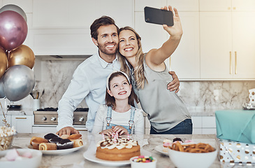 Image showing Selfie, parents or girl in celebration of a happy birthday in house party or kitchen with popcorn or cake. Mother, father or child bonding with love or care in family home take pictures to celebrate