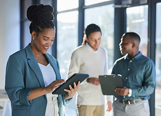 Image showing Digital tablet, office and professional black woman researching for corporate project with internet. Technology, business and African female employee working on report with mobile device in workplace