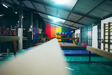 Image showing Balance beam, gymnastics fitness and training gym for gymnast performance in a sport club. No people, isolated and sports center for exercise, aerobics workout and arena competition practice