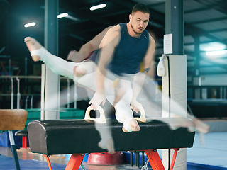 Image showing Gymnastics, fitness and man on balance beam for training, cardio and strength at gym. Athletic, male and acrobat practice speed, control and sport routine for muscle, power or endurance performance