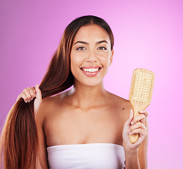 Image showing Hair, brush and portrait of woman on studio background for beauty cosmetics, skincare and color. Happy model comb hairstyle, growth and aesthetics for healthy shine, salon shampoo and facial smile