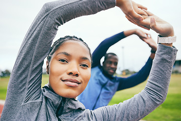 Image showing Portrait, black woman on field and stretching for fitness, workout and training for wellness, health and balance. Exercise, man and African American female athlete stretch arms, outdoor and practice