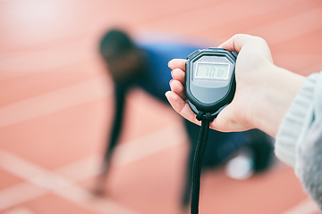 Image showing Sports, running and hands with stop watch on race track for exercise, marathon training and fitness. Stadium, workout and athlete team with timer for performance, lap speed and racing competition