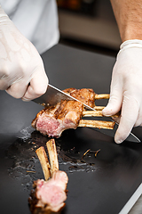 Image showing Chef sliced rack of lamb