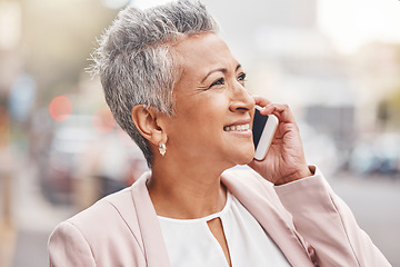 Image showing Senior woman, phone call and smile in the city for communication, conversation or discussion. Happy elderly female smiling on smartphone for 5G connection, talking or networking in an urban town