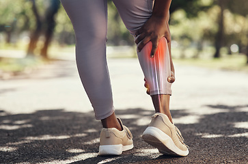 Image showing Woman, fitness and pain or injury on legs while running on outdoor road for exercise, workout and training. Sport person with red anatomy calf overlay for and massage for joint, accident or arthritis