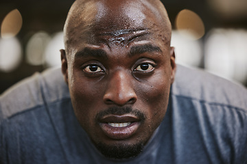 Image showing Face, portrait and sweating black man tired after exercise, workout or training resting after exercising in gym. Sports break, wellness and male athlete from Nigeria with fatigue, exhausted and sweat