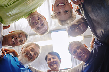 Image showing Senior exercise group, teamwork circle and low angle portrait with smile, diversity and support for health. Elderly fitness, team building and solidarity for happiness, hug or motivation for wellness