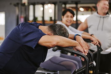 Image showing Cardio, gym and tired senior man with energy, break and lose weight challenge in fitness class or club. Community support, running health and fatigue of people exercise, workout and training together
