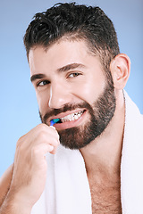 Image showing Brushing teeth, man and studio portrait of toothbrush for dental wellness, healthy lifestyle or mouth care. Happy face, male model and oral cleaning of fresh breath, smile and happiness on background