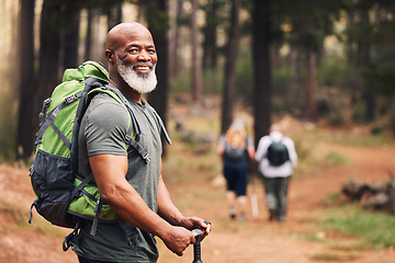 Image showing Portrait, black man and hiking in forest, exercise and fitness for wellness, healthy lifestyle and smile. Face, senior male and mature gentleman with backpack, smile and hiker in woods and fresh air