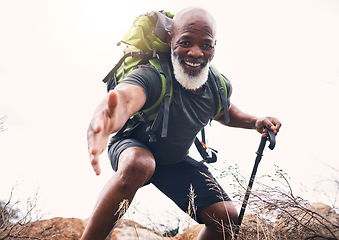 Image showing Hiking, help and portrait of senior man reaching hand during hike, fitness and cardio in nature on light background. Helping, hands and face of elderly guy offering support while trekking in a forest