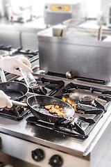 Image showing Chef doing flambe