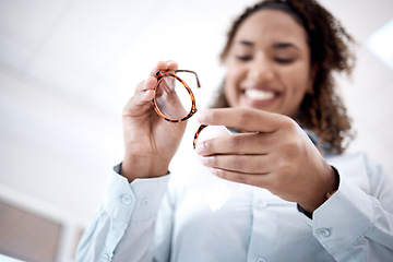 Image showing Hands, cleaning glasses and black woman with cloth, happy or excited for healthy vision in optometry office. Young african lady, spectacles or smile for eyes, health or wellness with designer frame