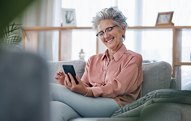 Image showing Elderly woman with smartphone, communication and relax at home, social media and happy with technology. Retirement, internet and chat online with wifi, happiness with reading ebook or news on website