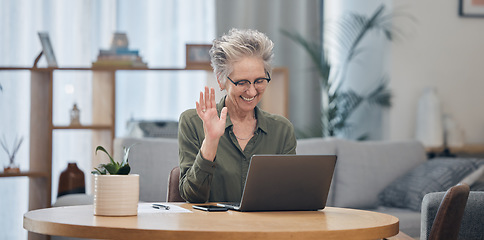 Image showing Laptop, video call and remote work with a senior woman at work in her home office for business communication. Computer, virtual meeting and planning with a mature female employee waving at her webcam