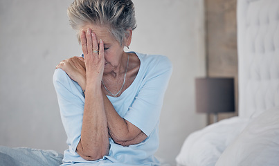 Image showing Headache, sick and mature woman with depression, anxiety or mental health problem in the bedroom. Sad, stress and elderly person with insomnia, migraine pain and depressed from fatigue or divorce