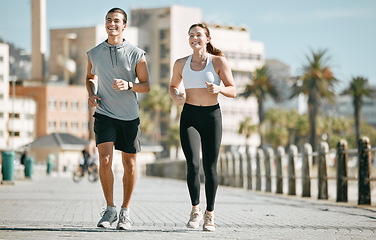 Image showing Couple, fitness and running together in the city for exercise, workout or cardio routine in Cape Town. Happy man and woman runner taking a walk or jog for healthy wellness or exercising outside