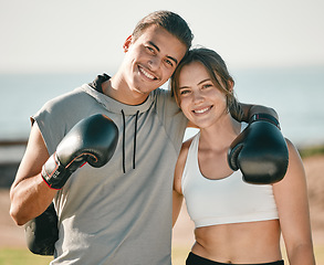 Image showing Couple, fitness and boxing exercise portrait outdoor in nature park for health and wellness. Woman and personal trainer happy about sports workout or mma training with motivation, energy and coaching