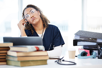 Image showing Nurse, thinking or planning in hospital research, wellness books study or laptop education vision in medicine scholarship. Medical student, woman or healthcare ideas for worker technology internship