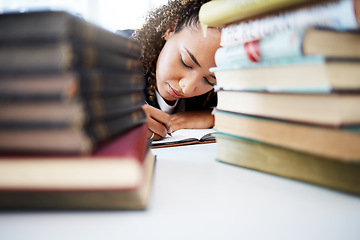 Image showing Student, writing or books pile in hospital research, education studying or university learning in medical school. Thinking, woman or healthcare nurse with notebook for medicine internship scholarship