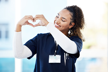 Image showing Doctor, volunteer or heart hands in hospital wellness, medicine trust or medical support in life insurance, help or vote. Smile, happy or nurse and love gesture in healthcare, emoji or woman security