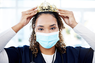 Image showing Crown, award and portrait of a doctor with a face mask for celebration, achievement and promotion. Success, winner and female nurse with a gift as motivation for nursing and healthcare with covid