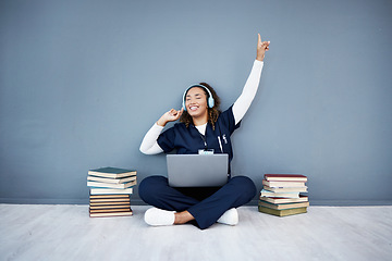 Image showing Doctor, laptop or headphones dance to hospital music, podcast or radio in woman study research or mock up learning. Smile, happy or dancing medical student on healthcare technology for books success