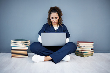 Image showing Nurse, laptop or typing in hospital research, wellness books study or education in medicine scholarship on mockup wall. Medical student, woman or healthcare technology for worker research internship