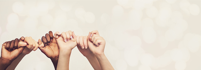 Image showing Hands, friends and holding hands with diversity and trust, pinky promise and mockup space on studio background. Team, support and solidarity with bokeh overlay, winning and people with connection