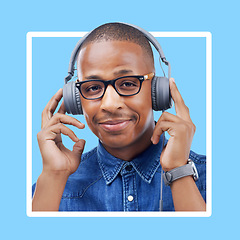 Image showing Black woman, portrait and headphones for music with a smile for motivation with blue background. Face of African model person listening to podcast or audio with color wallpaper backdrop in studio