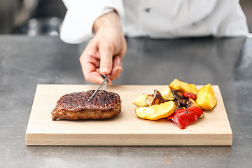 Image showing Chef served beef steak