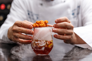 Image showing Fruit soup with dry ice