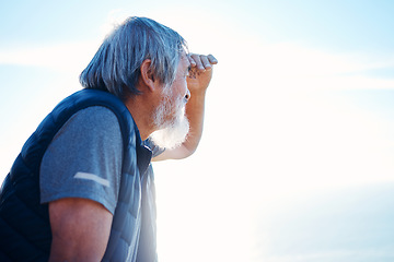 Image showing Search, looking and mature man in nature for hiking, travel and holiday to relax on a blue sky. Environment, exercise and elderly Asian person searching on an adventure during a vacation with mockup