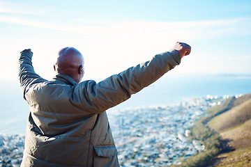 Image showing Back, black man and open arms on mountain, hiking and excited for victory, achievement and exercise. African American male, athlete outdoor or guy in nature, gesture for celebration or fitness target