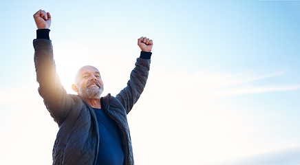 Image showing Success, hiking and portrait of man in nature for travel, fitness and freedom in Norway. Excited, motivation and mature person with celebration, achievement and climbing win on a blue sky with mockup