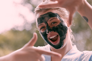 Image showing Face mask, finger frame and portrait of a woman with a self care, natural and beauty morning routine. Happy, smile and female with a picture hand gesture doing a charcoal skincare facial treatment.