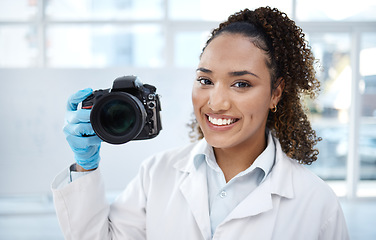 Image showing Camera, medical and portrait of black woman in forensics laboratory for investigation, crime scene and evidence. Research, analytics and observation with girl and digital pictures for science