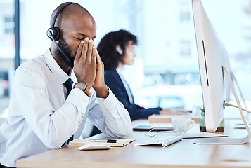 Image showing Business, black man and stress in call center, headache and depression with telemarketing, burnout and tired. Corporate, African American male agent or consultant with computer, overworked or anxiety