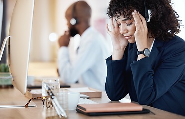 Image showing Mental health, depression and businesswoman or call center agent frustrated and sad in an office. Headache, pain and nausea by customer service worker, employee or consultant feeling depressed