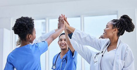 Image showing Success, high five and teamwork with doctors in hospital cheering for celebration, support or goal. Medical, healthcare and medicine with group of people and gesture for achievement, target or winner