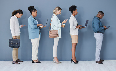 Image showing Business people, diversity or job interview waiting on technology queue, recruitment line or hr row. Vacancy, men or women in human resources, hiring or onboarding office on phone, laptop or tablet