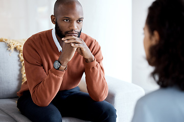 Image showing Mental health, depression and black man with a therapist for grief, depression or anxiety counseling. Psychology, sad and professional psychologist helping a African male patient in a clinic session.