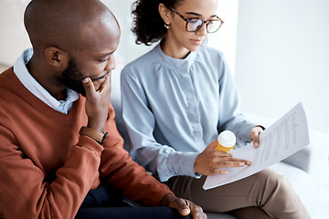 Image showing Therapy, mental health pills and man with depression, trauma or stress on psychologist couch. Person talking to woman therapist for psychology and anxiety prescription document for help or support