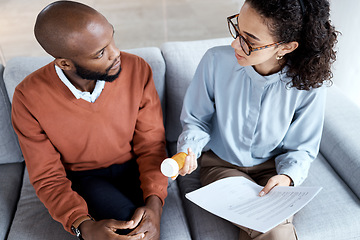 Image showing Mental health, therapy and pills for patient with depression, trauma or stress with psychologist. Man talking to woman therapist for psychology and anxiety medicine and paper for help or support