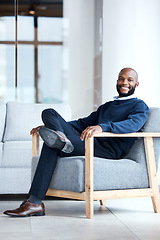 Image showing Portrait, black man in office and waiting on chair, smile and confident for job interview, resting and relax. Face, African American male employee and entrepreneur in workplace, happiness and joyful