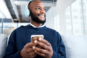 Image showing Black man, face and phone with headphones for music with smile, scroll social media and audio streaming. Online, listening to radio or podcast with happiness and relax with vision and mindset
