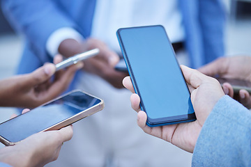 Image showing People, hands and phone screen on mockup for mobile app, advertising or marketing and social media. Hand of group with smartphone together for internet sharing, online collaboration or 5G networking